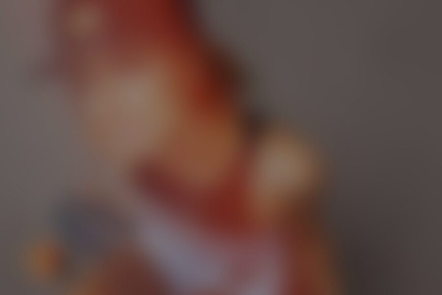 Blurred portrait of person with red hair